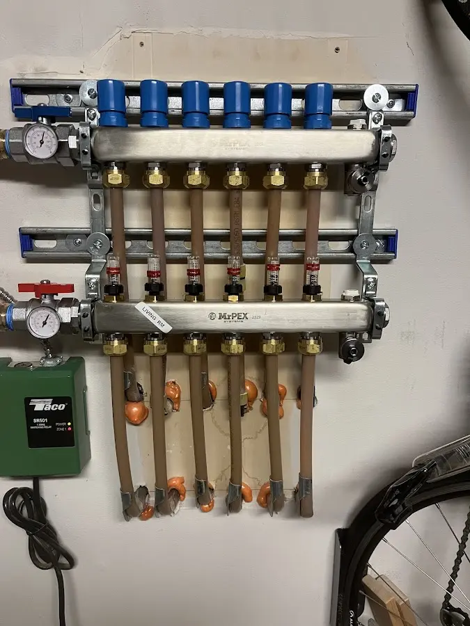 Plumber performing Water Heater Repair at a residential property in Rush City